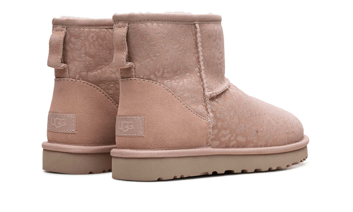 UGG WOMENS Classic Mini Womens "Snow Leopard Fleece Lined Pink" 1113494 QRT 1113494 QRT from Stadium Goods